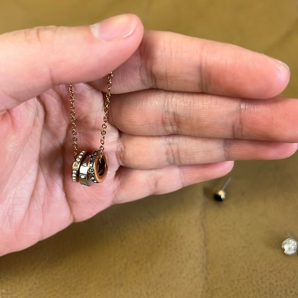 Swarovski Necklace plus one pair earrings and one heart silver shape earring